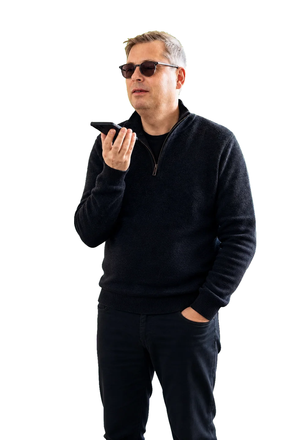 Jan holding his phone near his mouth to shop by voice